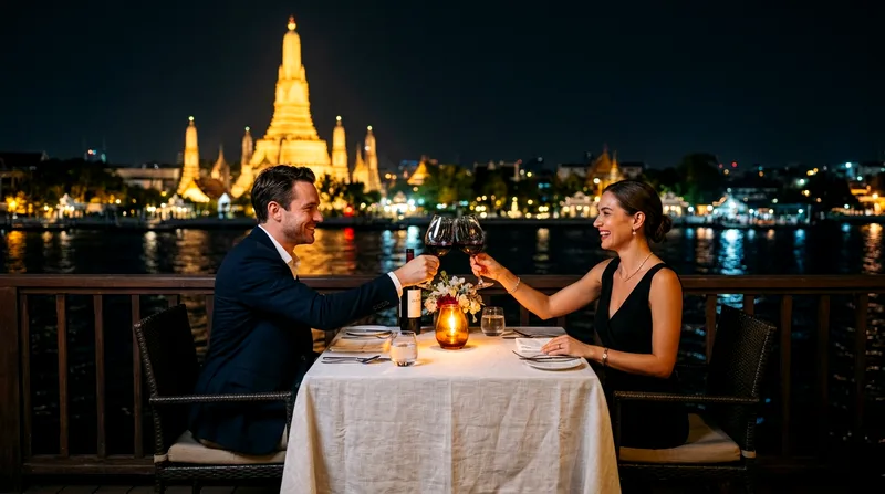 Couple toasting wine at candlelit riverside restaurant at night